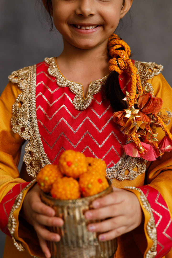 Yellow and Pink Asymmetric Kurta With Pants Set