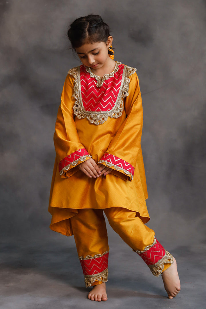 Yellow and Pink Asymmetric Kurta With Pants Set