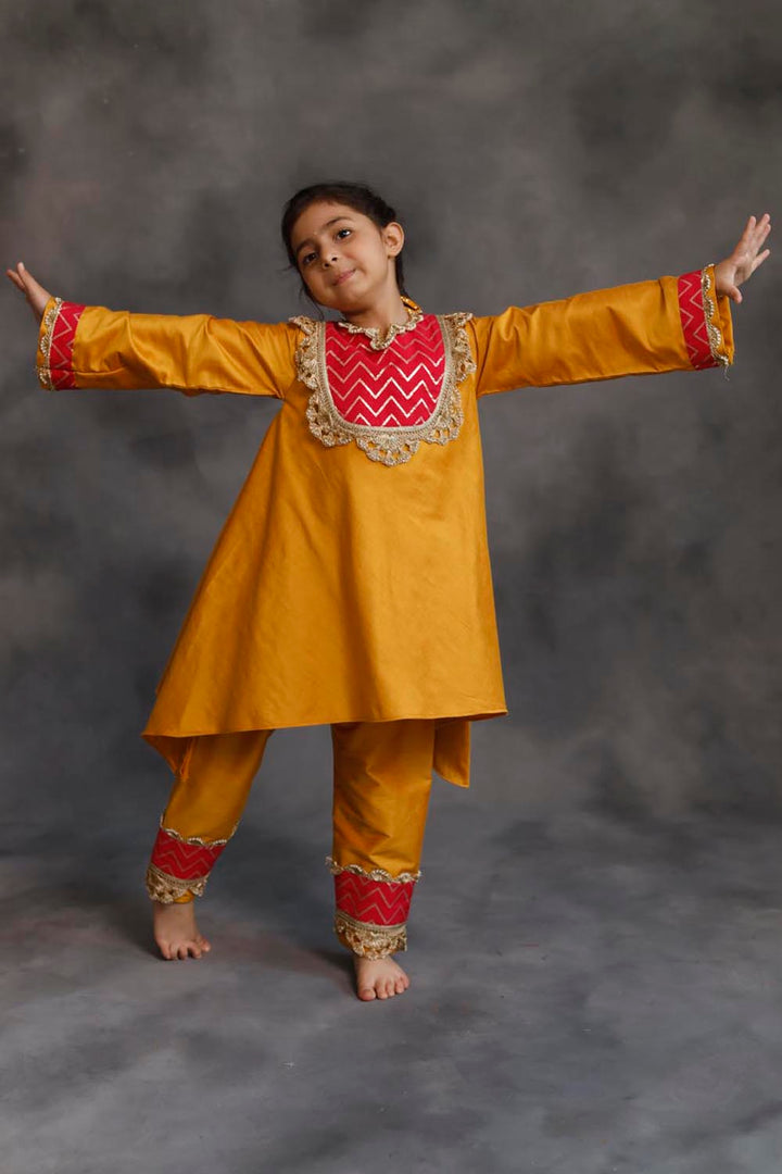Yellow and Pink Asymmetric Kurta With Pants Set