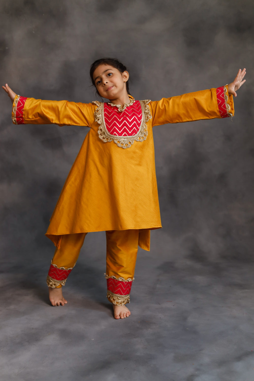 Yellow and Pink Asymmetric Kurta With Pants Set