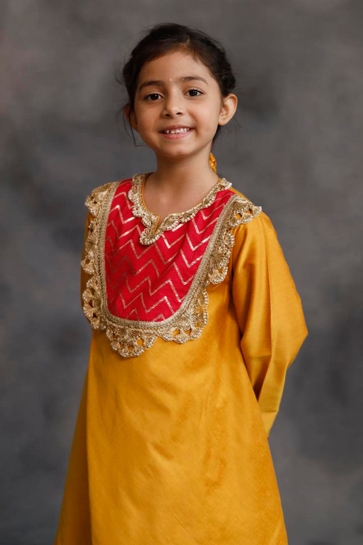 Yellow and Pink Asymmetric Kurta With Pants Set