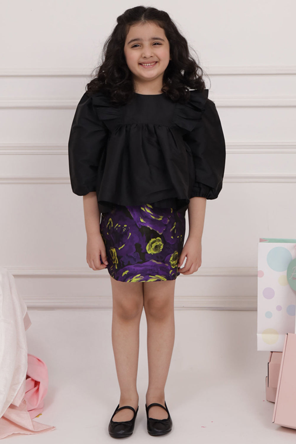 Black Ruffle Top with Short Purple Skirt
