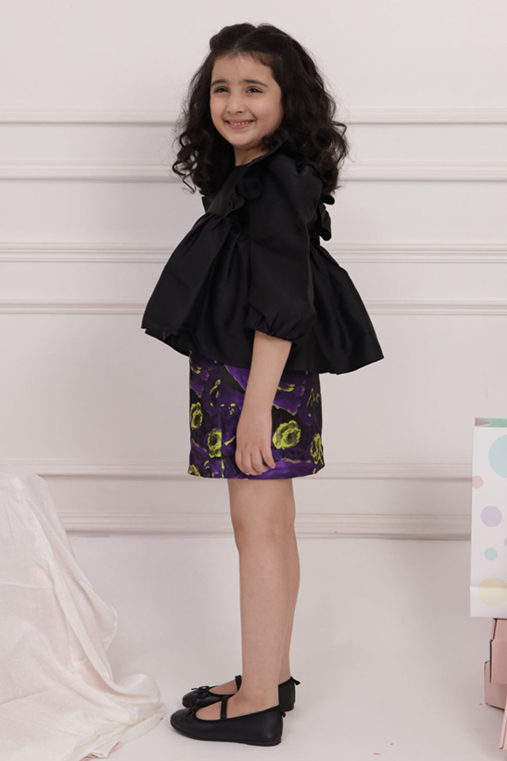 Black Ruffle Top with Short Purple Skirt