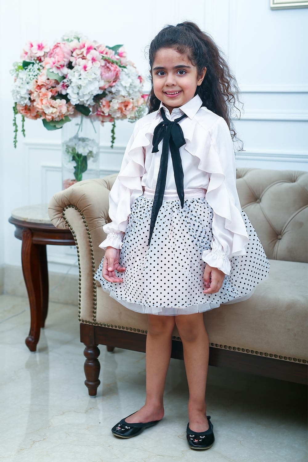 Crepe Satin Ruffle Top With Black Tie-Up And Dot Net Skirt – Pink Kids Co-ord Set | PNK – Isha Arora India