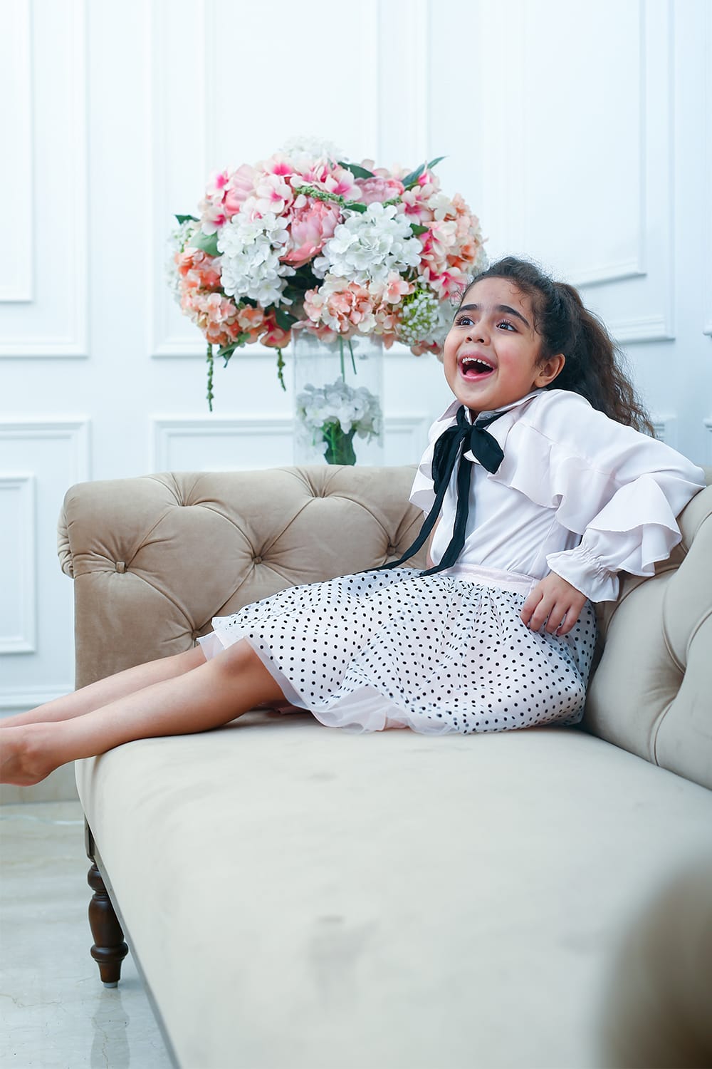 Crepe Satin Ruffle Top With Black Tie-Up And Dot Net Skirt – Pink Kids Co-ord Set | PNK – Isha Arora India