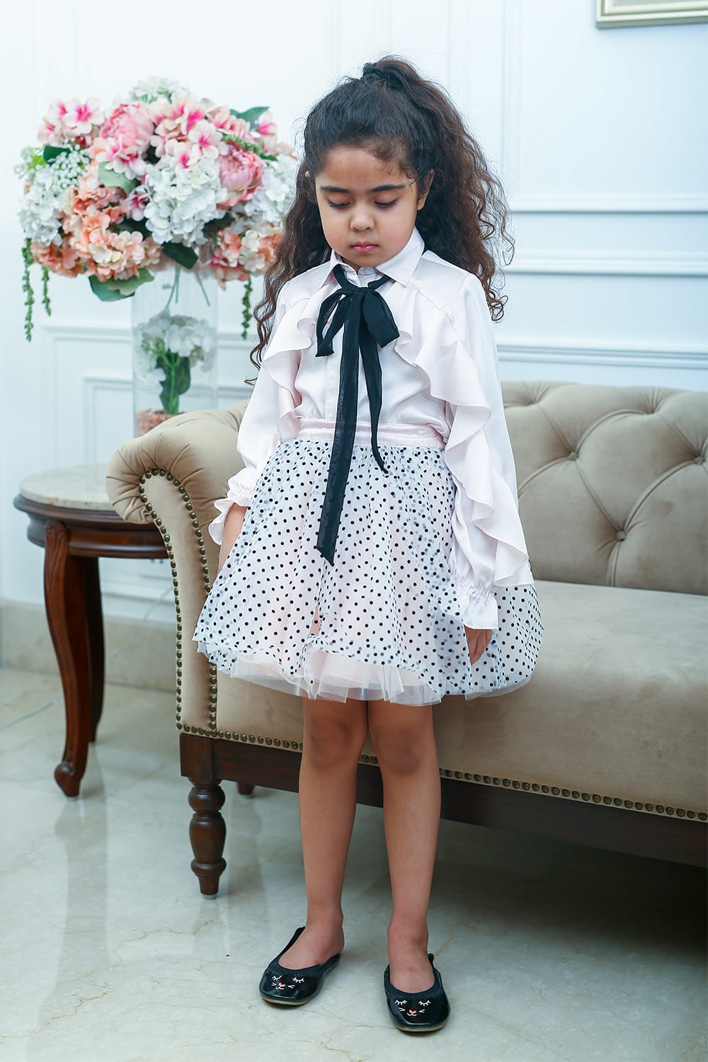 Crepe Satin Ruffle Top With Black Tie-Up And Dot Net Skirt – Pink Kids Co-ord Set | PNK – Isha Arora India