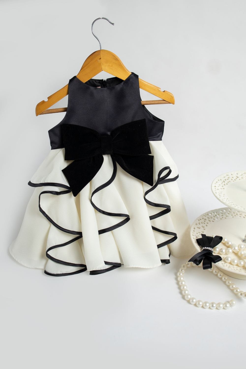 Swirly Dress with Bow – Ivory Designer Dress for Girls | PNK – Isha Arora India
